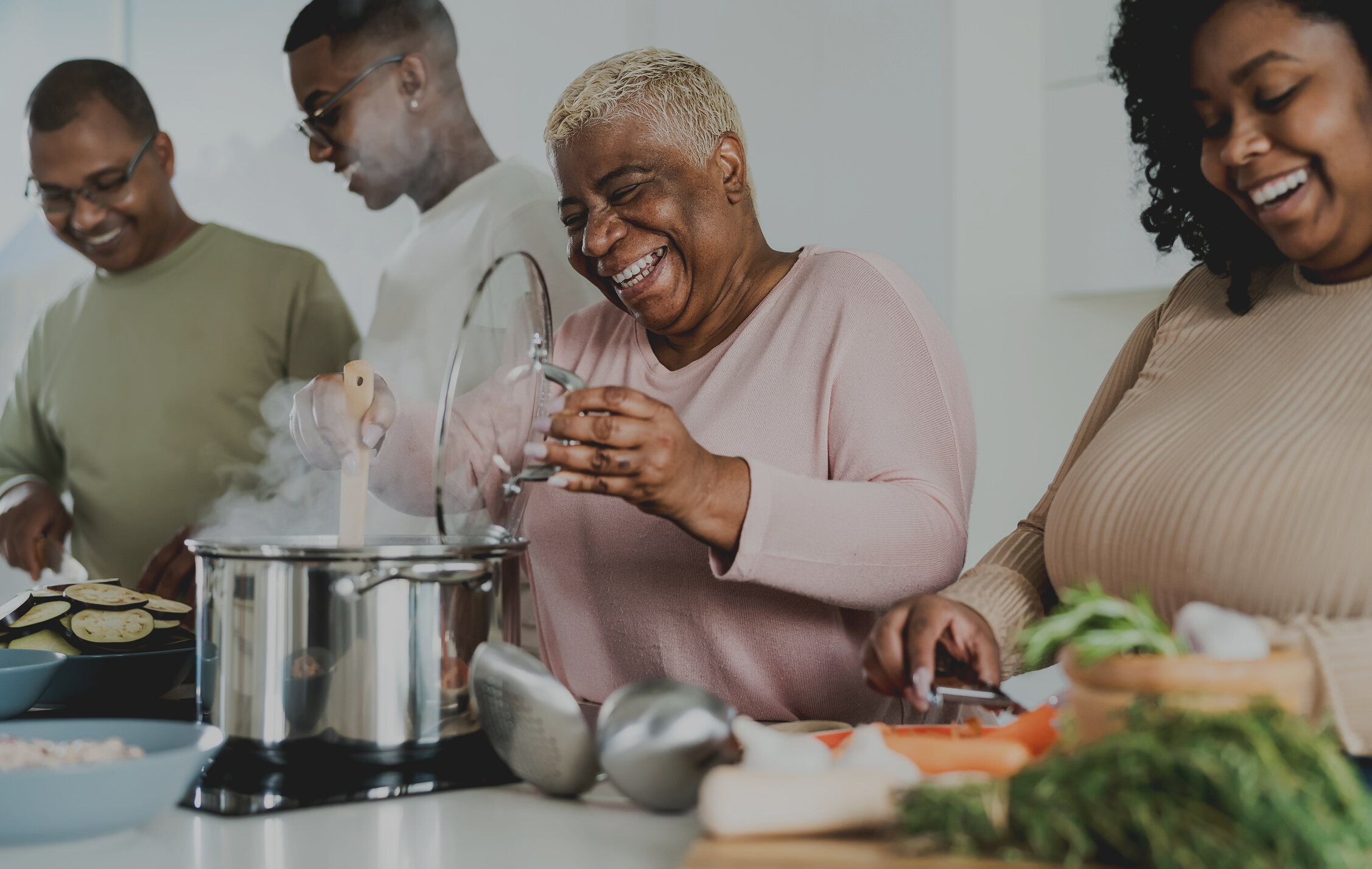 Family Happily Cooking Together